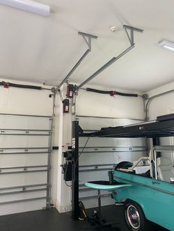Garage Door Opener Broken Spring Off Track Adjustment Replace And Parts