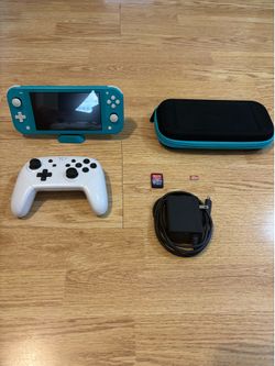Nintendo Switch Lite Blue 32GB Bundle w/ Extra Game Storage And More