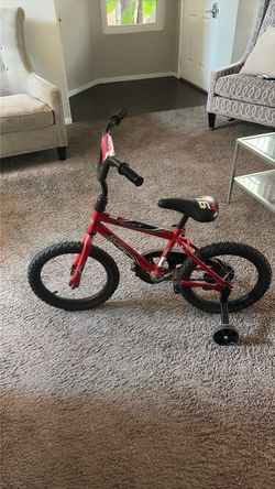 Huffy bike with training wheels 🚲