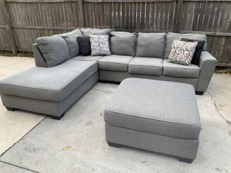 Beautiful sectional and ottoman and we can deliver for no extra