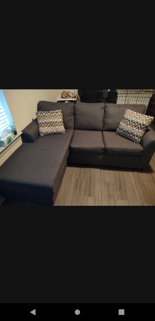Small Dark Grey Couch With Footrest