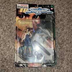 Vintage 1999 Soul Calibur Xainghua Action Figure New Sealed Epoch 1/12. Cardboard is warped. Corner is bent. Black stand is loose in box 