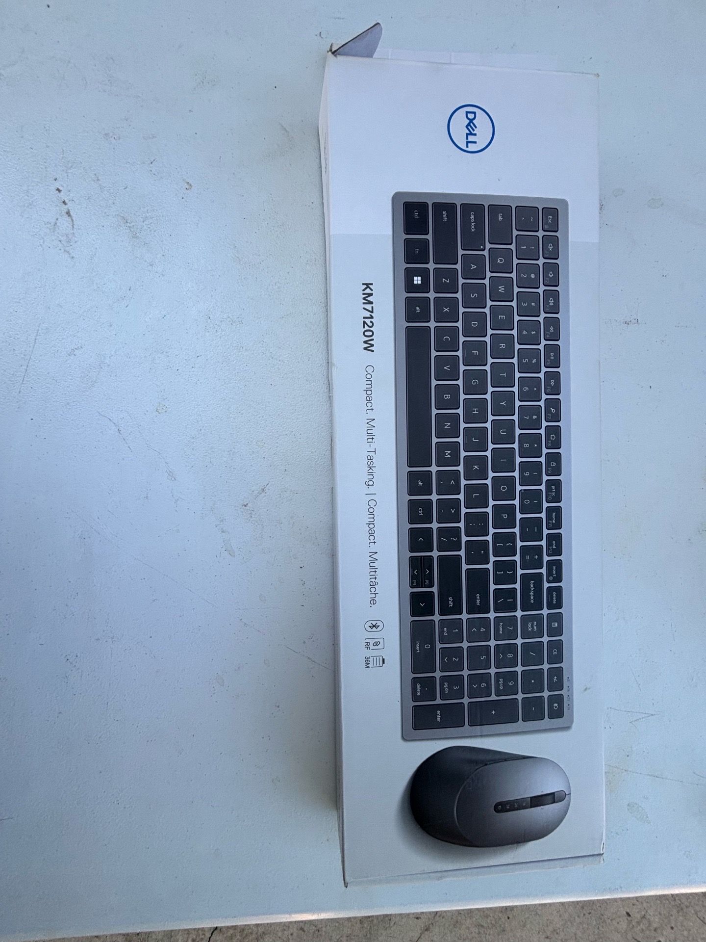 Dell KM7120W Multi-Device Wireless Keyboard and Mouse combo in Titan Gray.