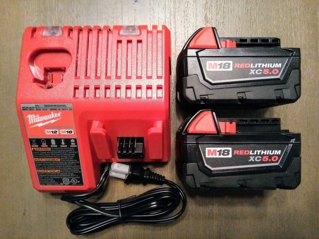 2 Milwaukee M18 XC5.0 Batteries & Charger