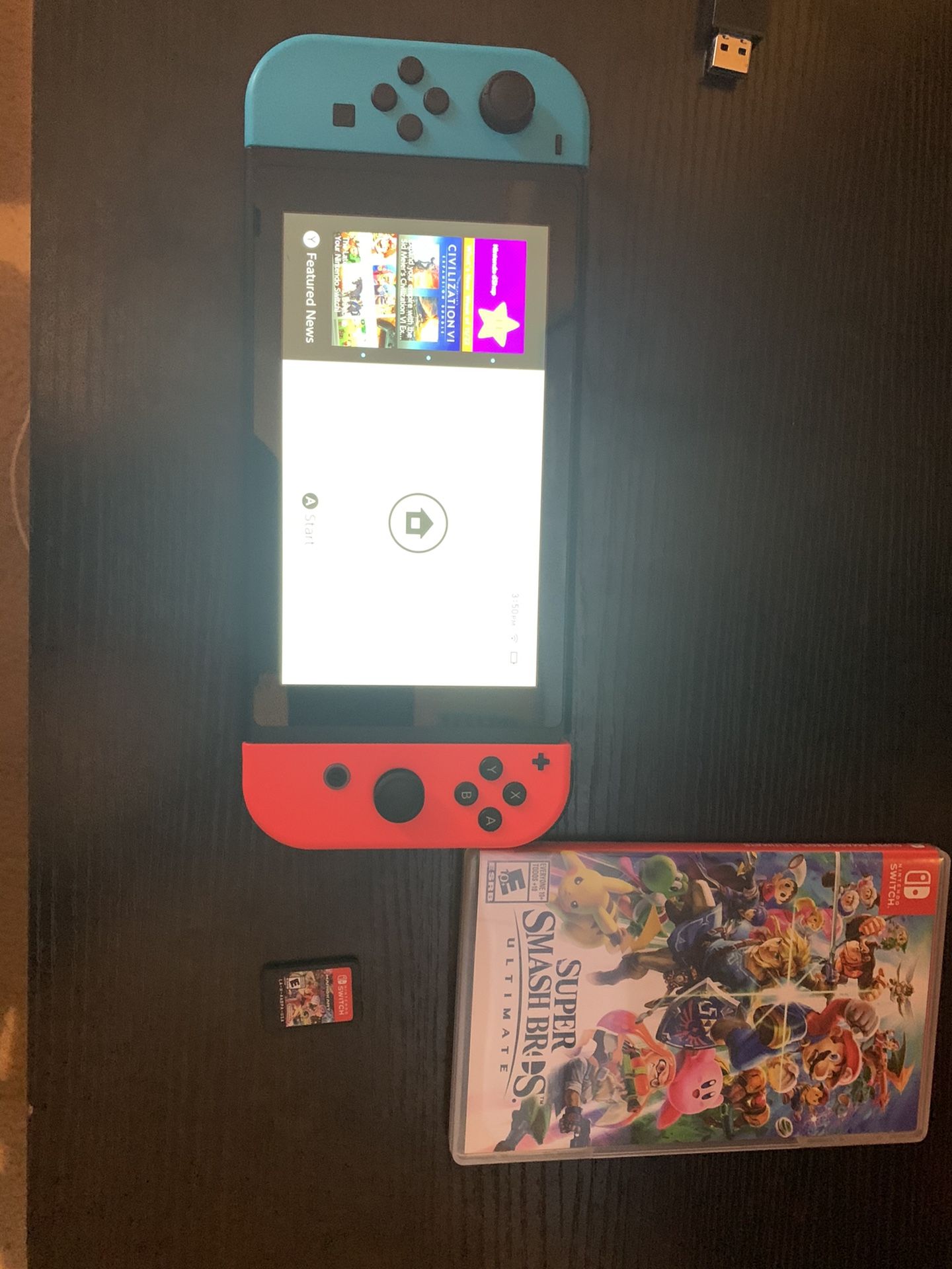 Nintendo switch w/ Mario Kart and Super Smash bro’s
