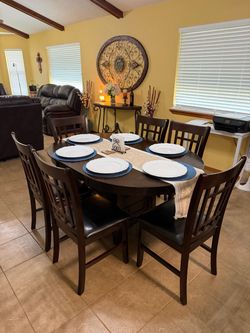 Dark Wood Oval Dining Table with 6 Chairs