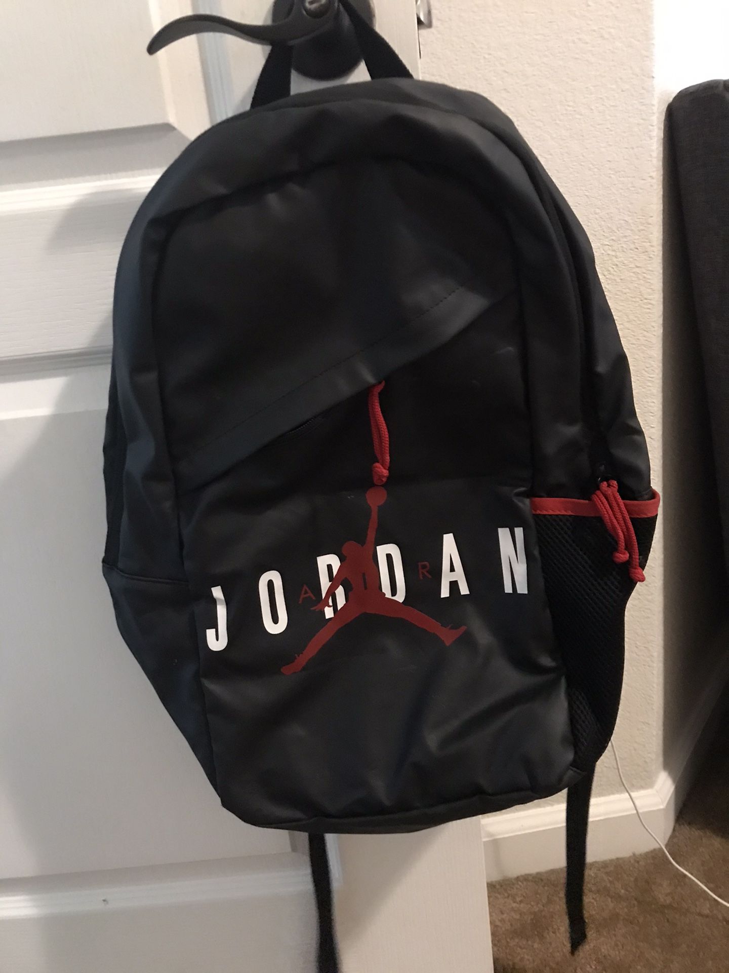 Black and red jordan backpack good condition only issue second small zipper doesn’t zip everything else excellent