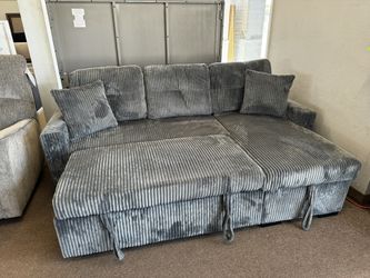 Reversible Sectional With Pullout Bed And Storage