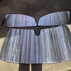 Sunshades- Windshield ,and Side Driver And Passenger  Door.