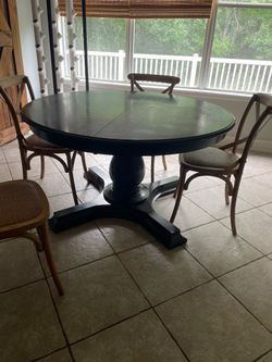 Pedestal dining table
