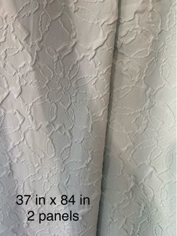 Set Curtains light blue .