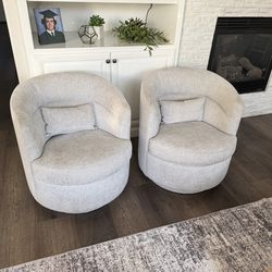Light gray swivel chairs