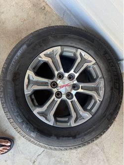 GMC sierra SLT OEM wheels and tires. Brand new