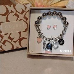 Beautiful Silvertone Guess Charm Bracelet $18