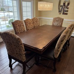 Elegant large dining room  table with chairs
