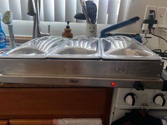Stainless steel Oster buffet server with three individual 2.5-quart pans