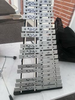 Prarl 32 keys xylophone with mallet and bag only. No stand. Sounds fantastic. Bag has small tear Location below 31705 Wesley Chapel blvd Fl 33543 Stor