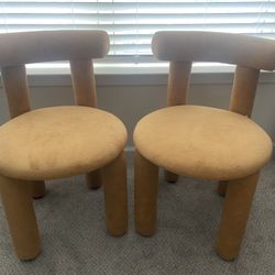 Yellow boucle dining chairs