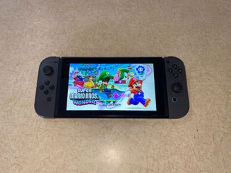 NINTENDO SWITCH V2 MOD + 512GB and 7500 Games