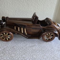 Antique roadster collectible, hand carved
