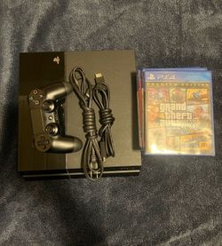 Sony ps4 with games and controller