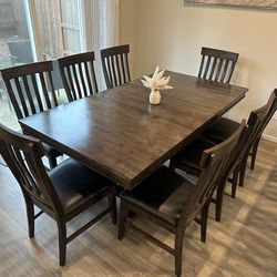 Super solid hardwood dining table 8 big chairs . Bought it for $2500. It’s super heavy table .  I have attached all the pictures of wear and tear on t