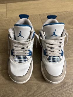 Air Jordan 4 White and Blue Sneakers