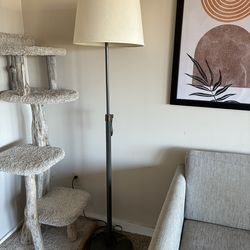 Solid metal floor lamp