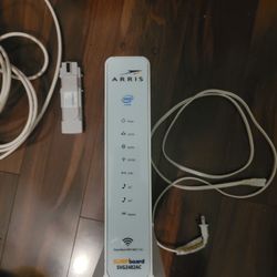 Arris SURFBOARD  Cable Modem w/ Voice,  Battery & Cord