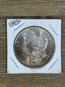 $1 Dollar Morgan silver toned 1883-O coin BU