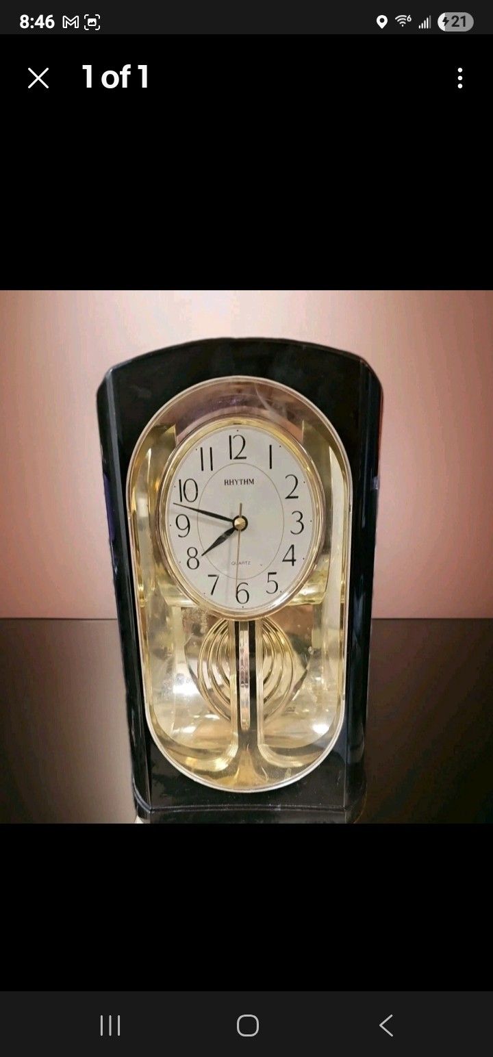 Rhythm Hypnotic Front to Back Pendulum Mirrored Quartz Clock 10" Black & Gold