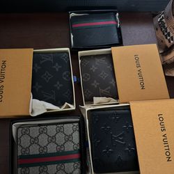 new lv and gucci wallets 