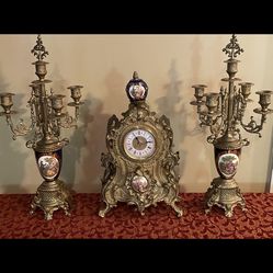 Antique Clock and Candle Arranagement 