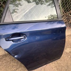RIGHT REAR DOOR FOR 2010-2015 TOYOTA PRIUS 3ER GENERATION DARK BLUE COLOR (SMALL DENT).