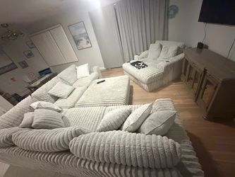 Ashley’s furniture stupendous sectional and ottoman and double love seat