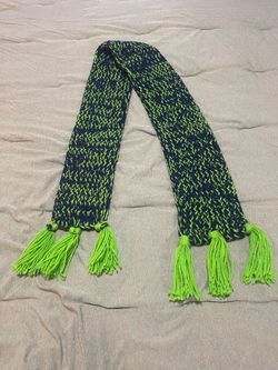 Knit Seahawk colored scarf and cap.