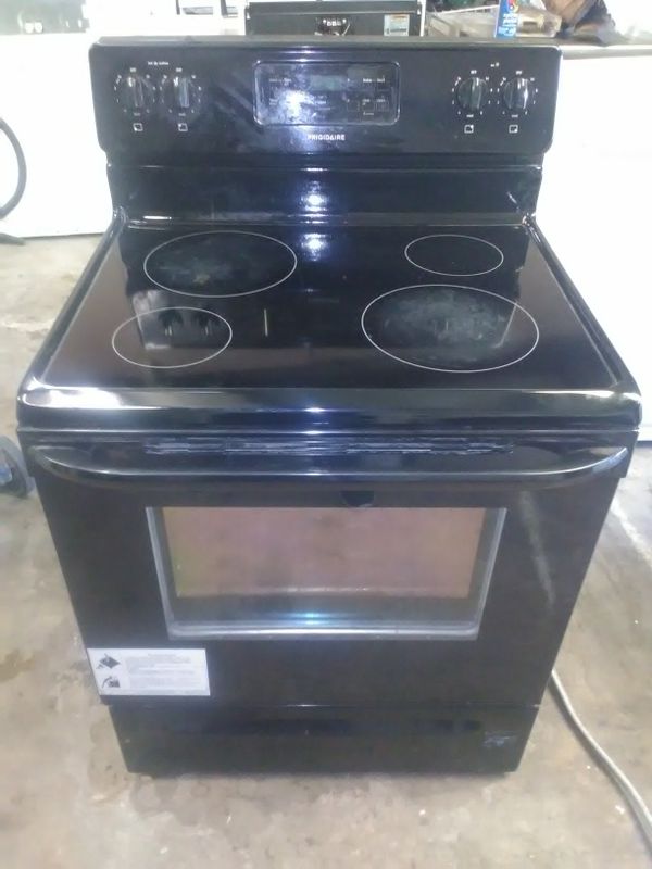 Black Frigidaire electric glass top stove with warranty for Sale in