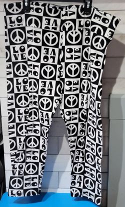Junior's Cropped "LOVE/PEACE" Sueded Capri Leggings 
$4 each (One Available In Size M 7-9 and Two Available In Size XXXL 21)
