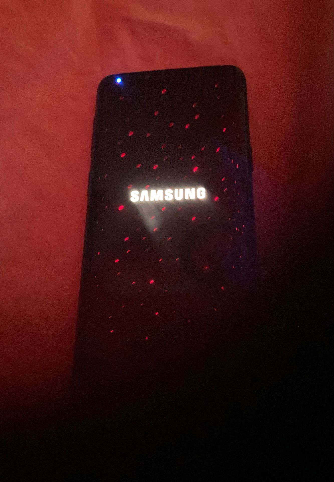 Galaxy s 9 small crack right up side with Samsung-G2 watch