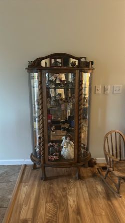 Curved front curio cabinet