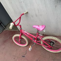This is a Pacific Cycle 16" Kids' Bike in pink with Lolli branding.