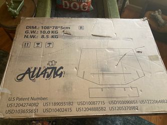 BRAND NEW AJIG 2000 PIECE PUZZLE BOARD ( CORNER SLIGHTLY DAMAGED) ONLY $25
