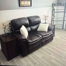 Leather power reclining loveseat