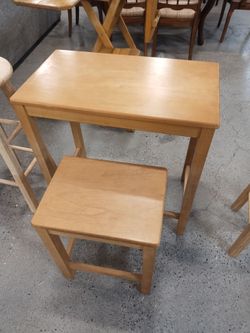 Wooden table with stool