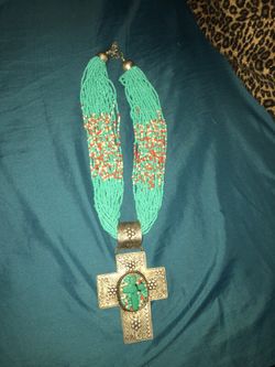 Turquoise beaded hammered cross