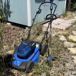 Kobalt battery powered lawnmower and weed eater