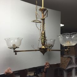 Antique brass and etched glass globes converted from gas