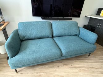 Selling excellent condition two-seater sofa