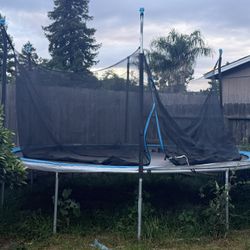 Almost New Trampoline 15 Foot With Net! 