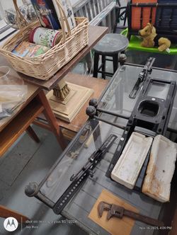 A Little Hard To See But It Two Small Glass Tables With Black Medal And Two Small Wooden Tables Stacked On Each Other $15 Each All 4 For $50
